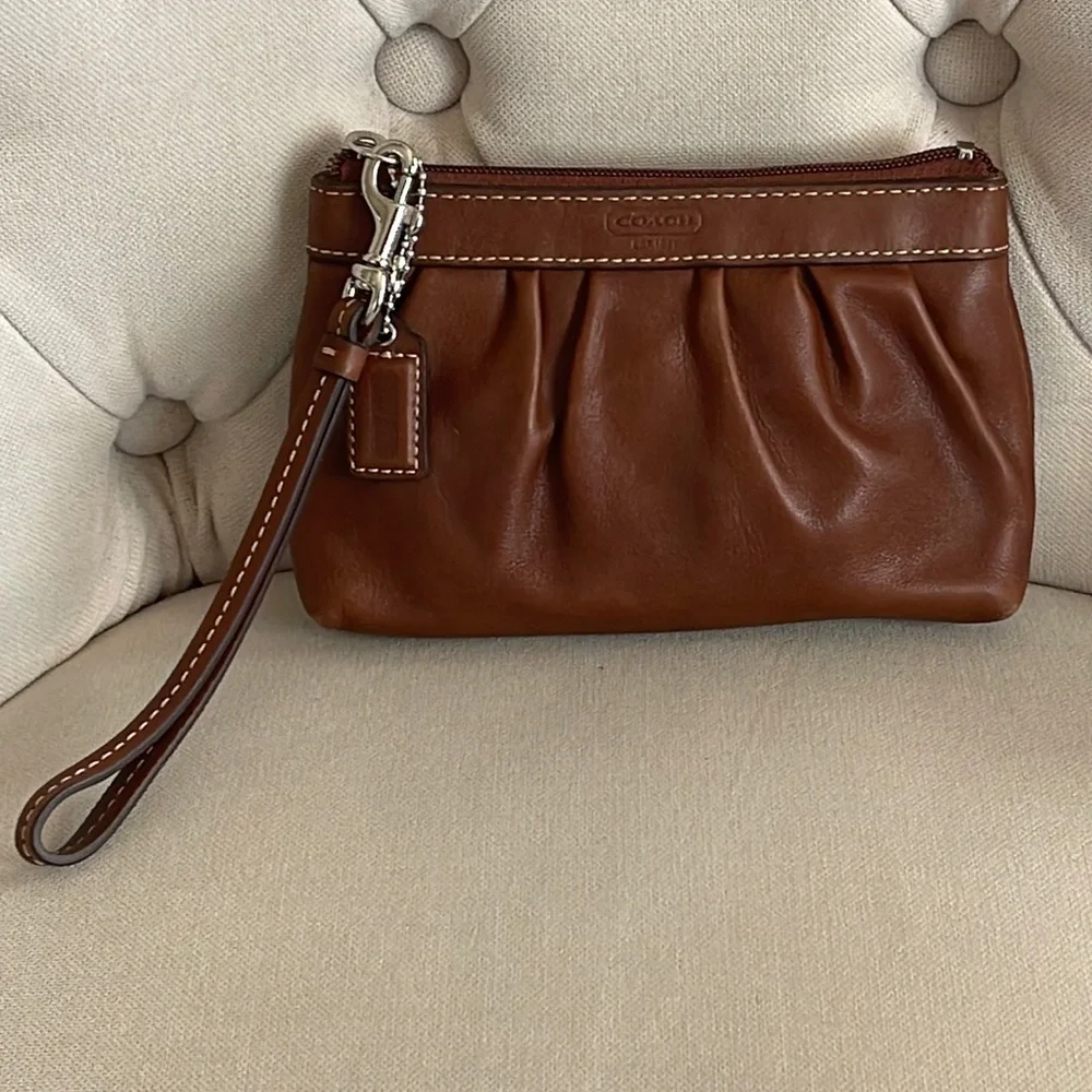 Brown leather Coach wristlet